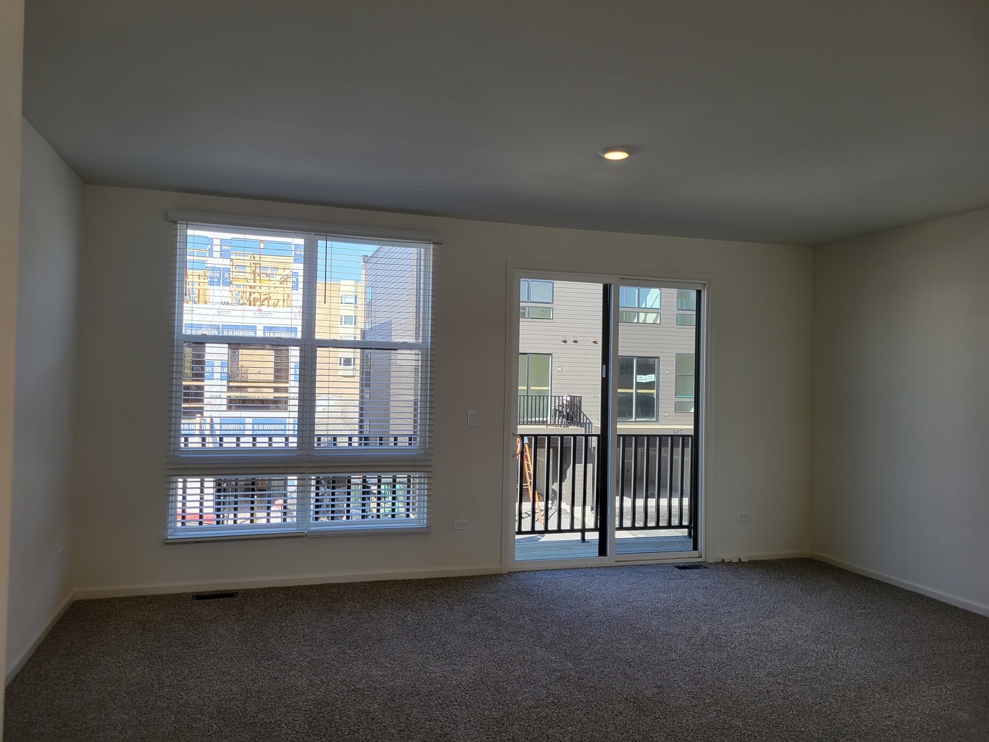 340 Summit Circle Lombard, IL 60148 - Photo 7 of 14 a view of a big room with windows