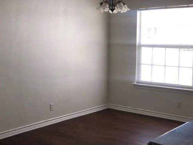 an empty room with a window