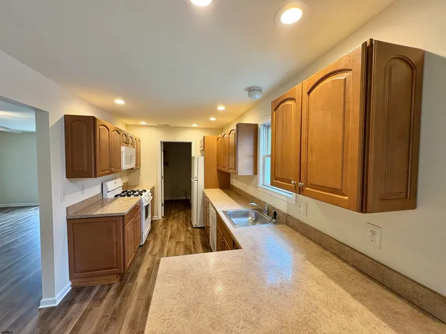 a view of a living room with a flat screen tv