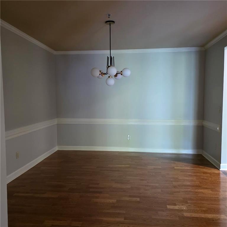 2865 Lenox Road Northeast, Unit 407 Atlanta, GA 30324 - Photo 5 of 27 a view of a room with wooden floor