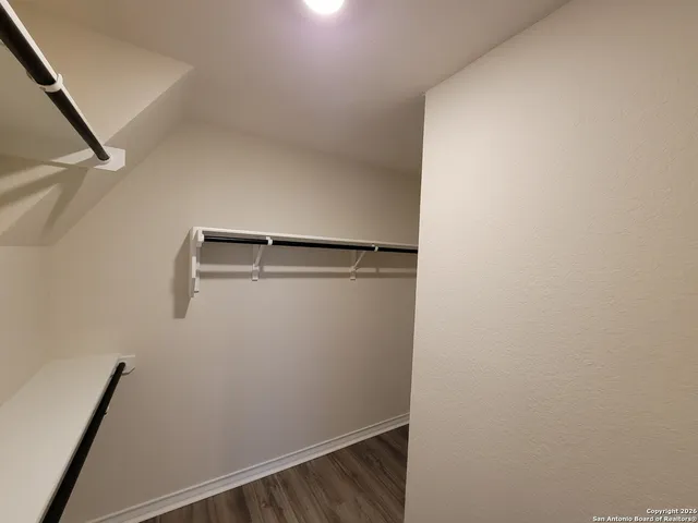 a view of small space with racks on the wall