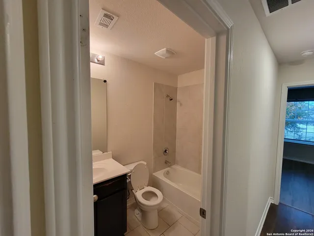 a bathroom with a sink and a tub