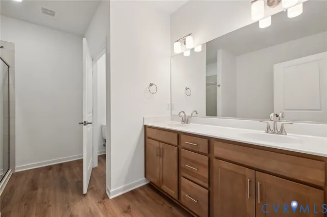 a view of a livingroom with wooden floor