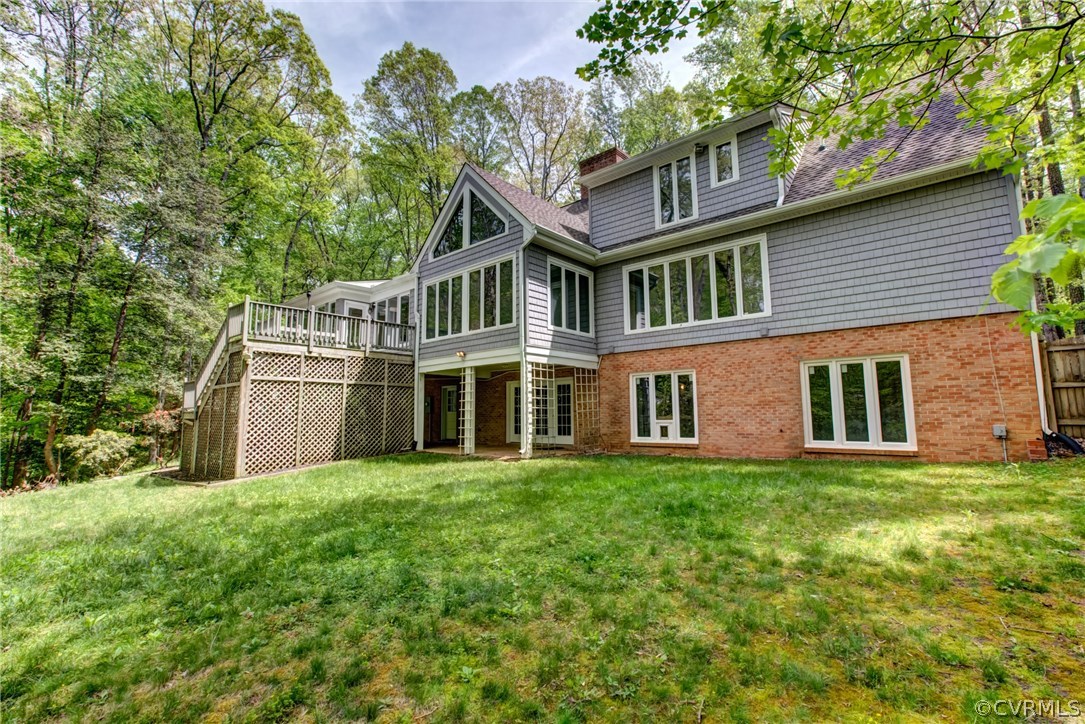 2441 Camelback Road Richmond, VA 23236 - Photo 3 of 36 a front view of a house with a garden