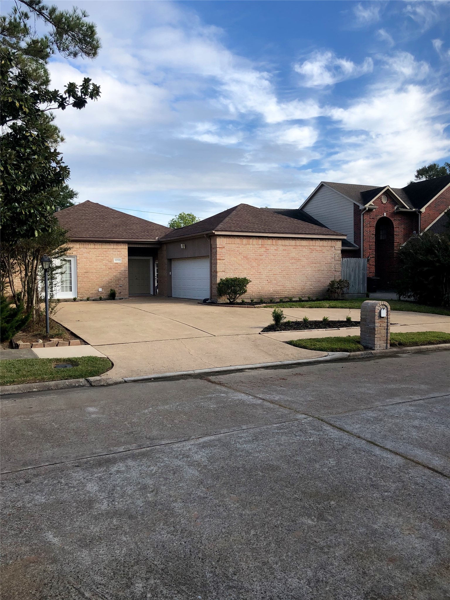 10310 Chevy Chase Drive Houston, TX 77042 - Photo 2 of 36 a street view with residential house