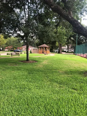 a view of a patio with a yard