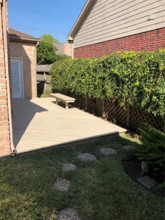 a view of a backyard of the house