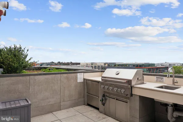 a view of a terrace with oven