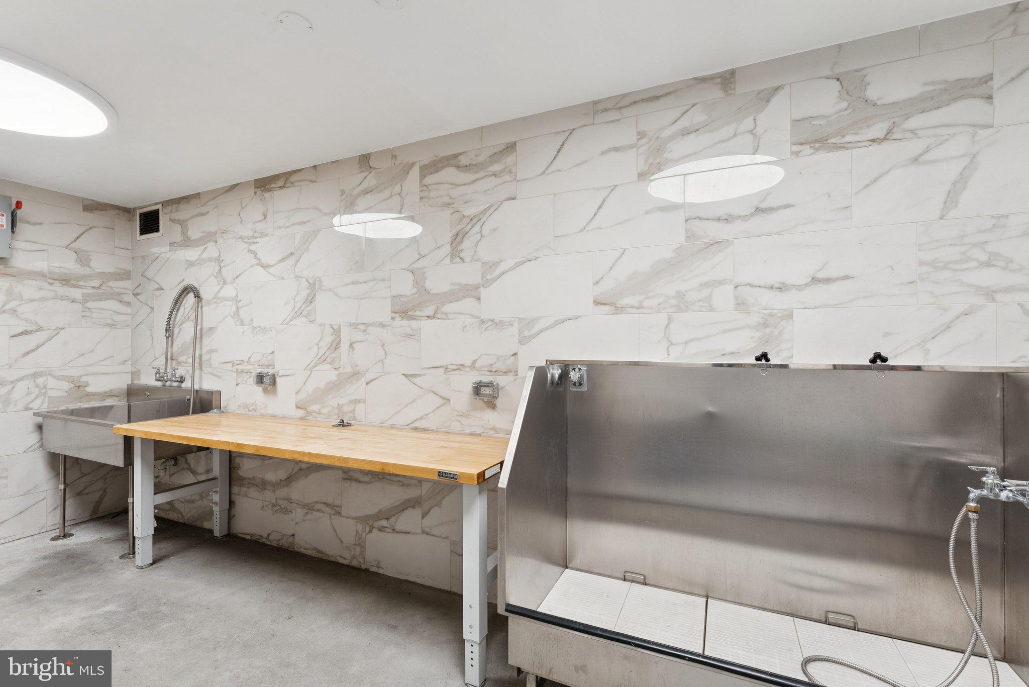1211 Van Street Southeast, Unit 913 Washington, DC 20003 - Photo 28 of 38 a bathroom with a sink and a bathtub