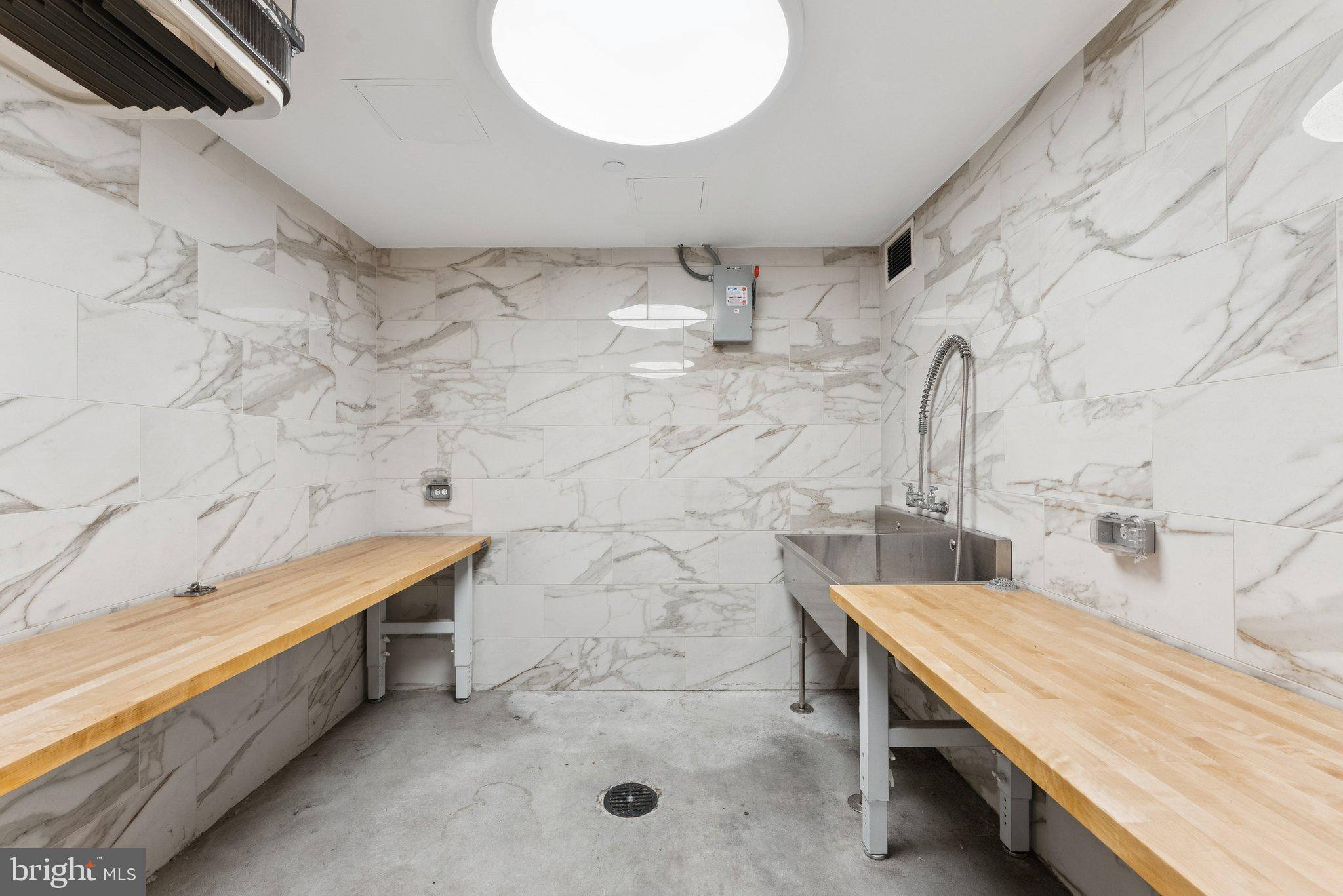 1211 Van Street Southeast, Unit 913 Washington, DC 20003 - Photo 29 of 38 a bathroom with a sink and a mirror