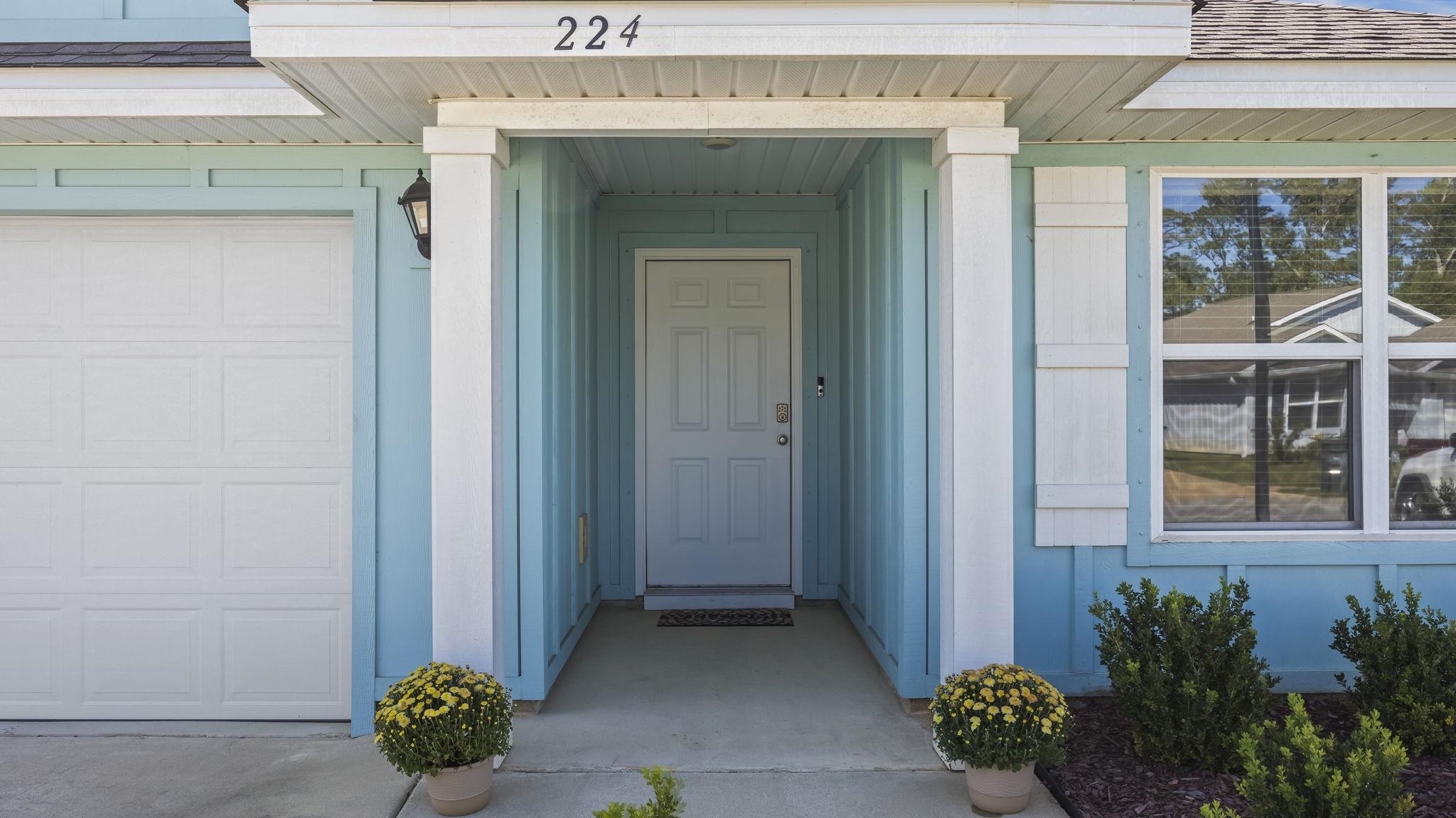224 Burnston Way Foley, AL 36535 - Photo 5 of 42 Doorway to property with a garage