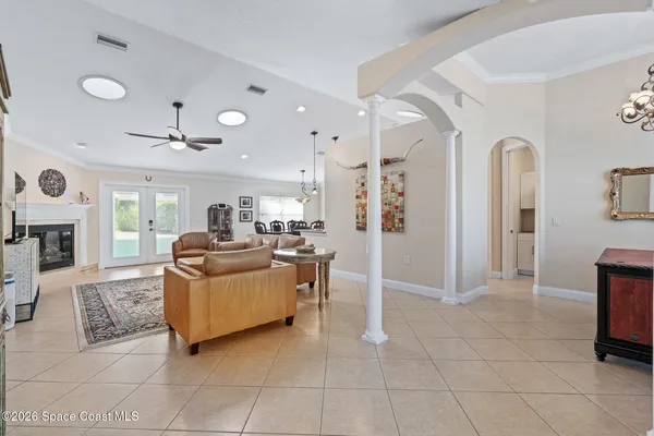 a dining room with a table and chairs