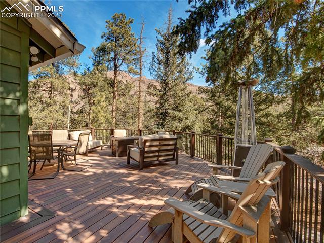 4955 Dodd Road Cascade, CO 80809 - Photo 36 of 45 Deck with outdoor lounge area