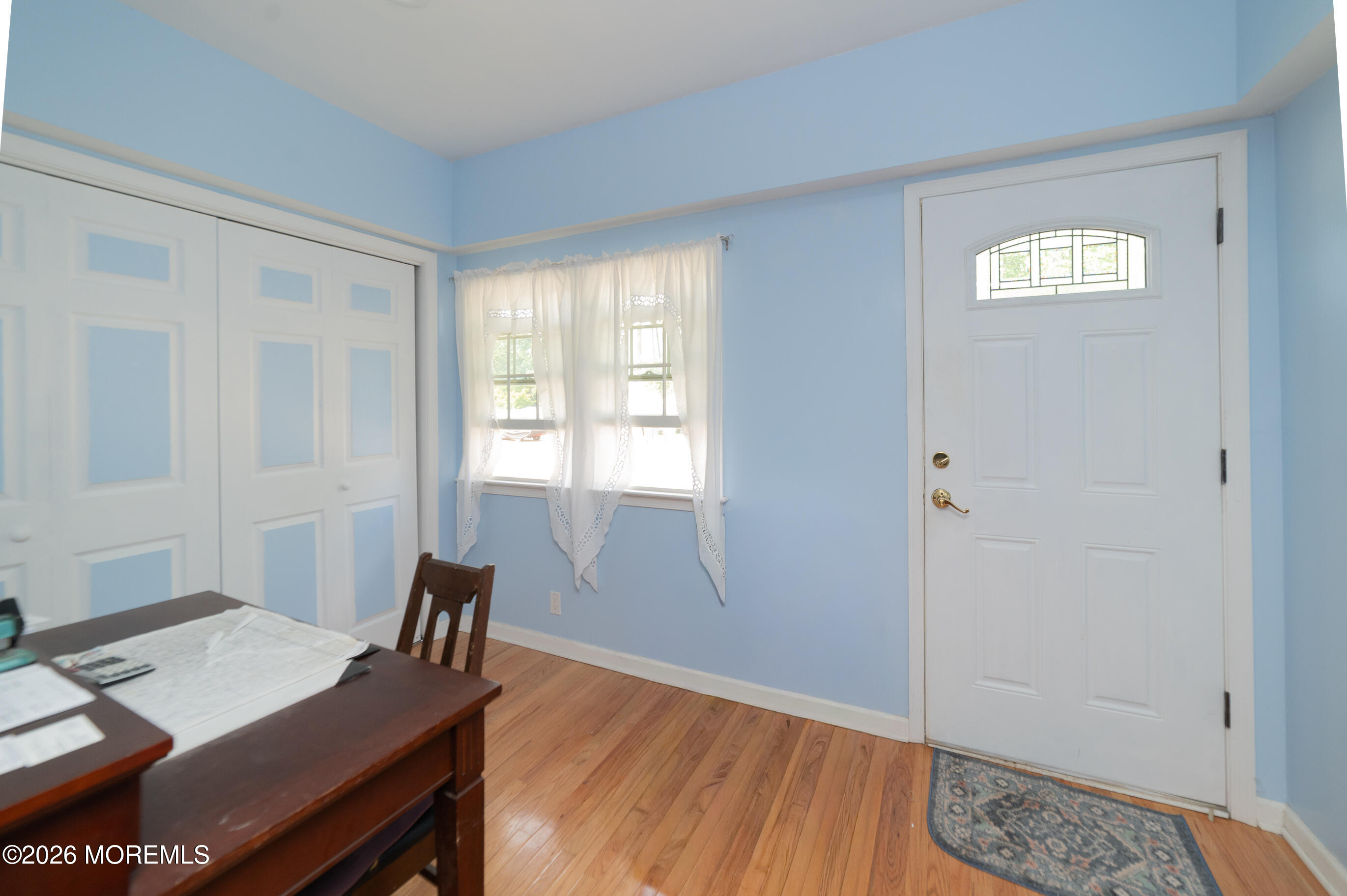 38 Walnut Street Keyport, NJ 07735 - Photo 11 of 19 a view of a workspace with furniture and wooden floor