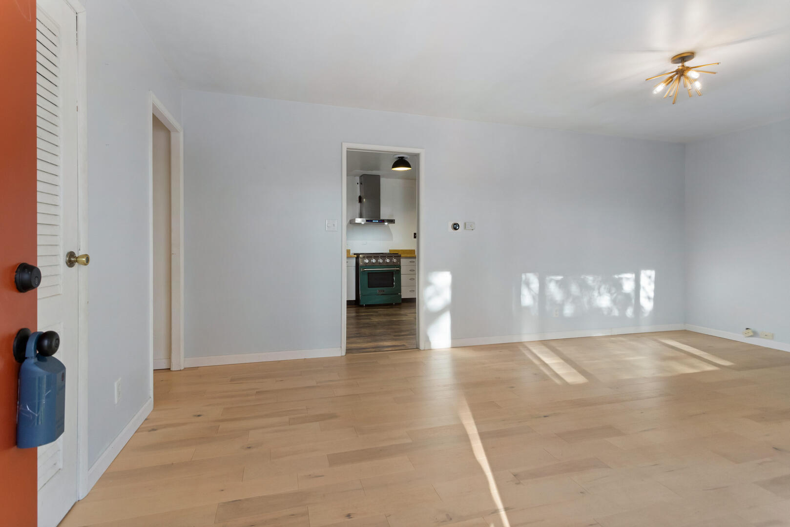 1709 Crescent Drive Champaign, IL 61821 - Photo 2 of 27 a view of empty room with wooden floor