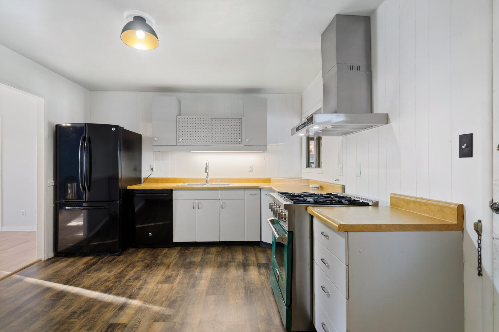 1709 Crescent Drive Champaign, IL 61821 - Photo 7 of 27 a kitchen with a stove and a refrigerator