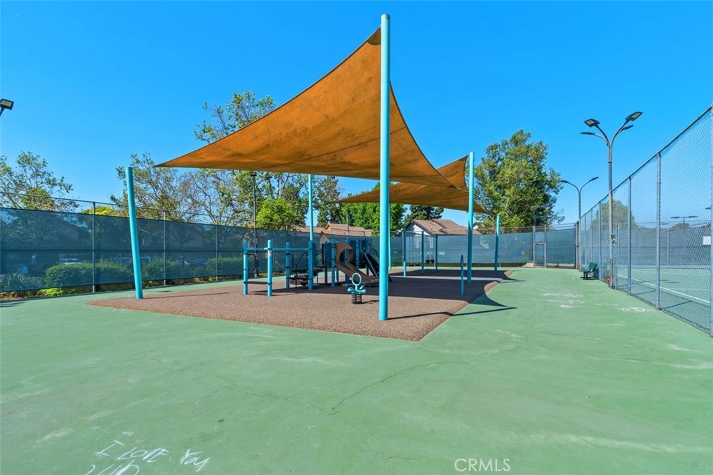 89 Lemon Grove Irvine, CA 92618 - Photo 30 of 34 a view of a park with slide