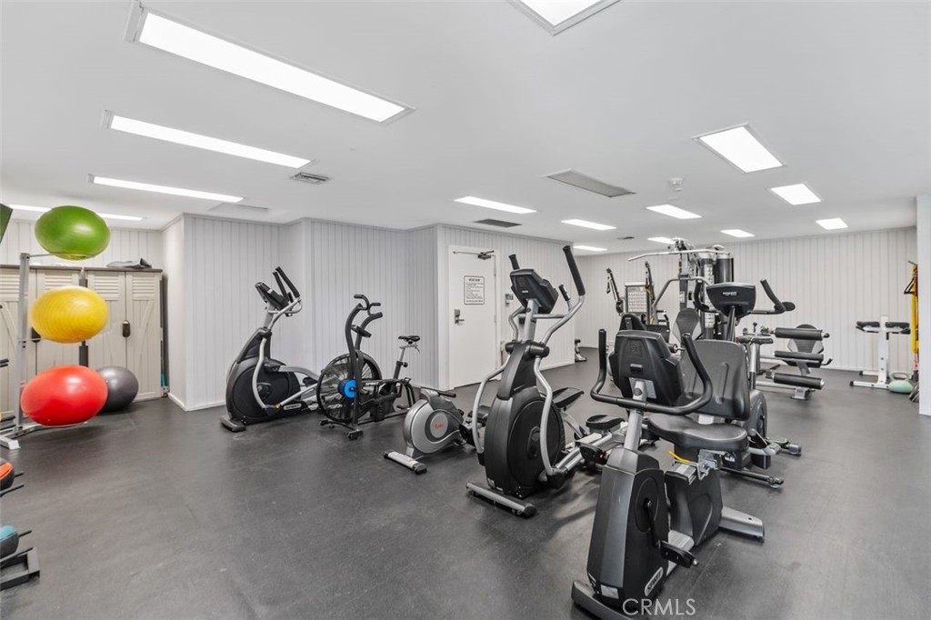 89 Lemon Grove Irvine, CA 92618 - Photo 33 of 34 a view of a room with gym equipment