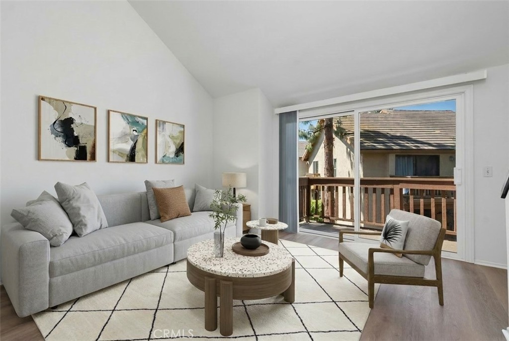 89 Lemon Grove Irvine, CA 92618 - Photo 8 of 34 a living room with furniture and a large window
