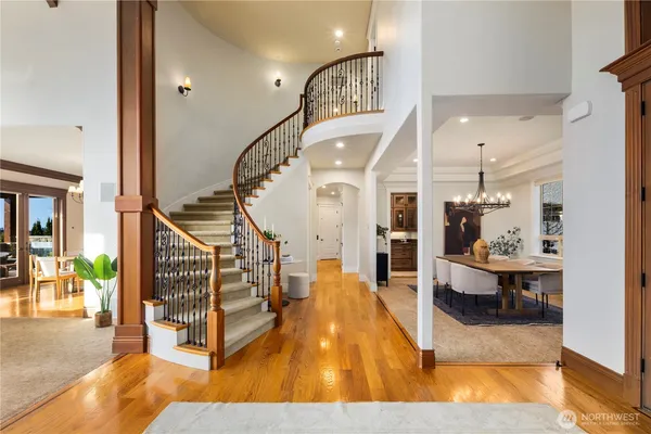 a view of livingroom and dining room with wooden floor
