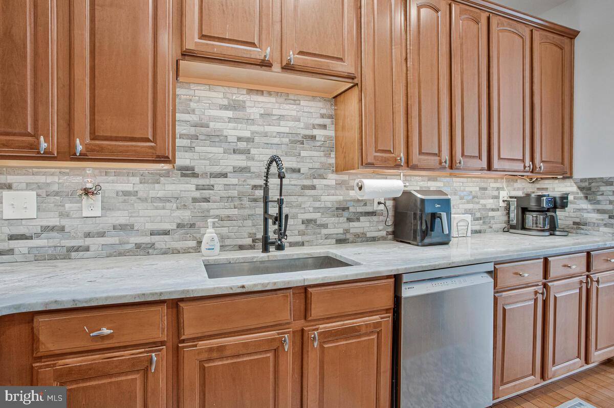 3515 Cromarty Lane Edgewater, MD 21037 - Photo 14 of 53 a kitchen with stainless steel appliances granite countertop a sink and cabinets