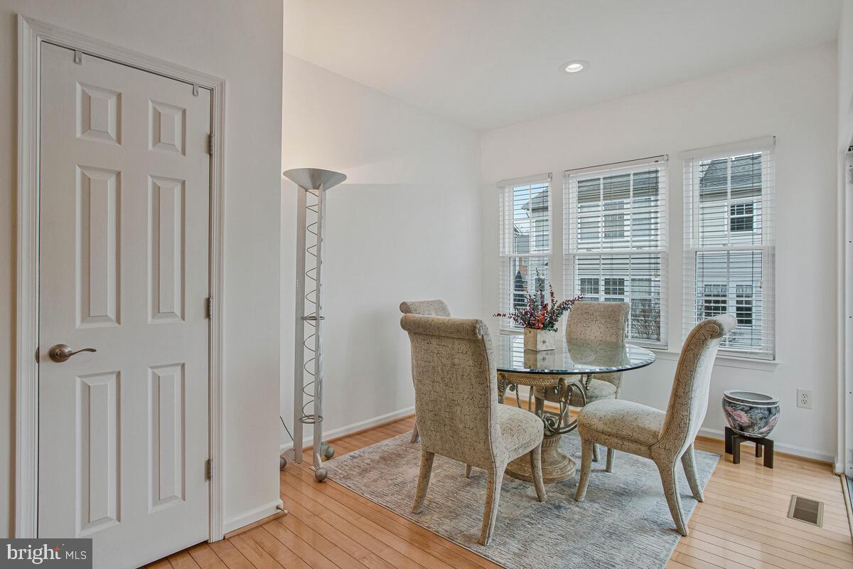 3515 Cromarty Lane Edgewater, MD 21037 - Photo 17 of 53 a view of a dining room with furniture window and wooden floor