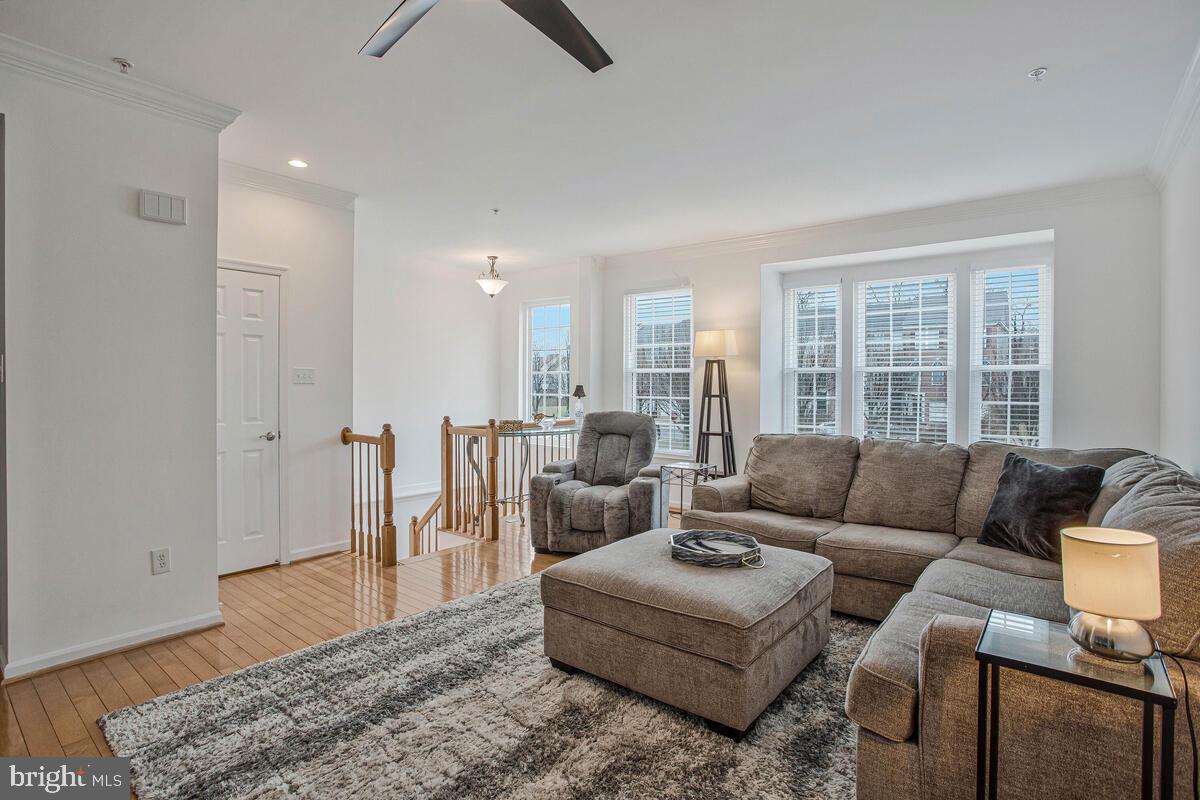 3515 Cromarty Lane Edgewater, MD 21037 - Photo 23 of 53 a living room with furniture and a large window