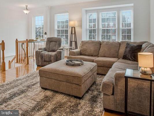3515 Cromarty Lane Edgewater, MD 21037 - Photo 25 of 53 a living room with furniture and a large window