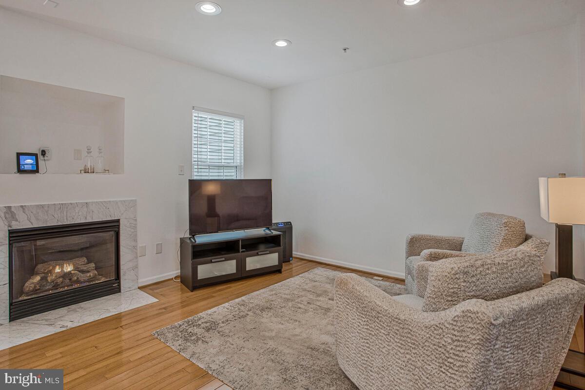 3515 Cromarty Lane Edgewater, MD 21037 - Photo 26 of 53 a living room with furniture and a fireplace
