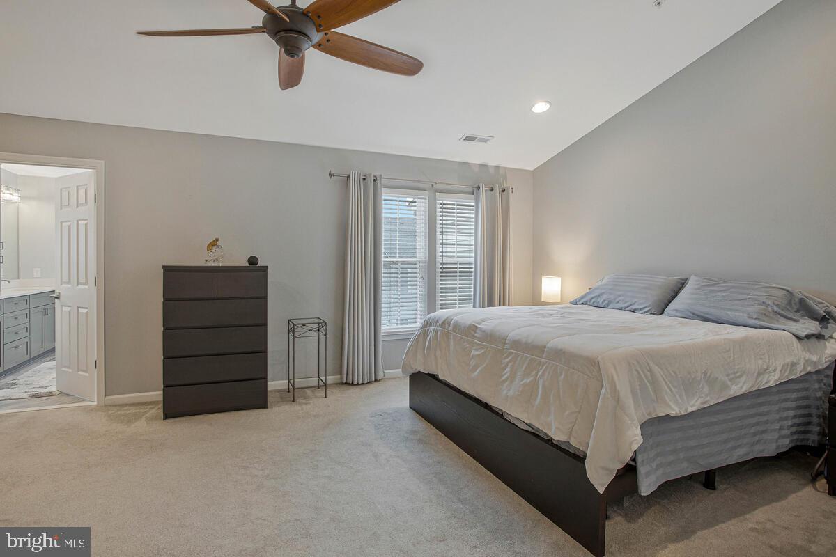 3515 Cromarty Lane Edgewater, MD 21037 - Photo 27 of 53 a bed sitting in a spacious bedroom and a dresser