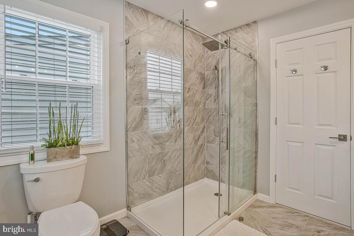3515 Cromarty Lane Edgewater, MD 21037 - Photo 31 of 53 a bathroom with a shower and a toilet