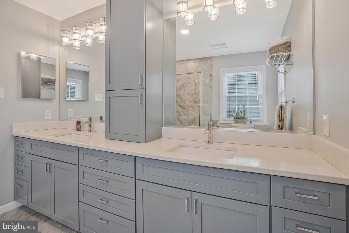 3515 Cromarty Lane Edgewater, MD 21037 - Photo 33 of 53 a bathroom with double vanity and a mirror