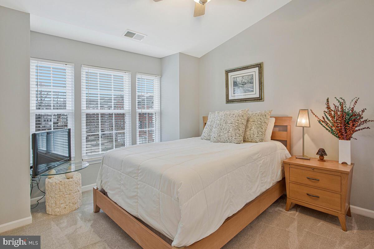 3515 Cromarty Lane Edgewater, MD 21037 - Photo 34 of 53 a bedroom with a bed and a large window