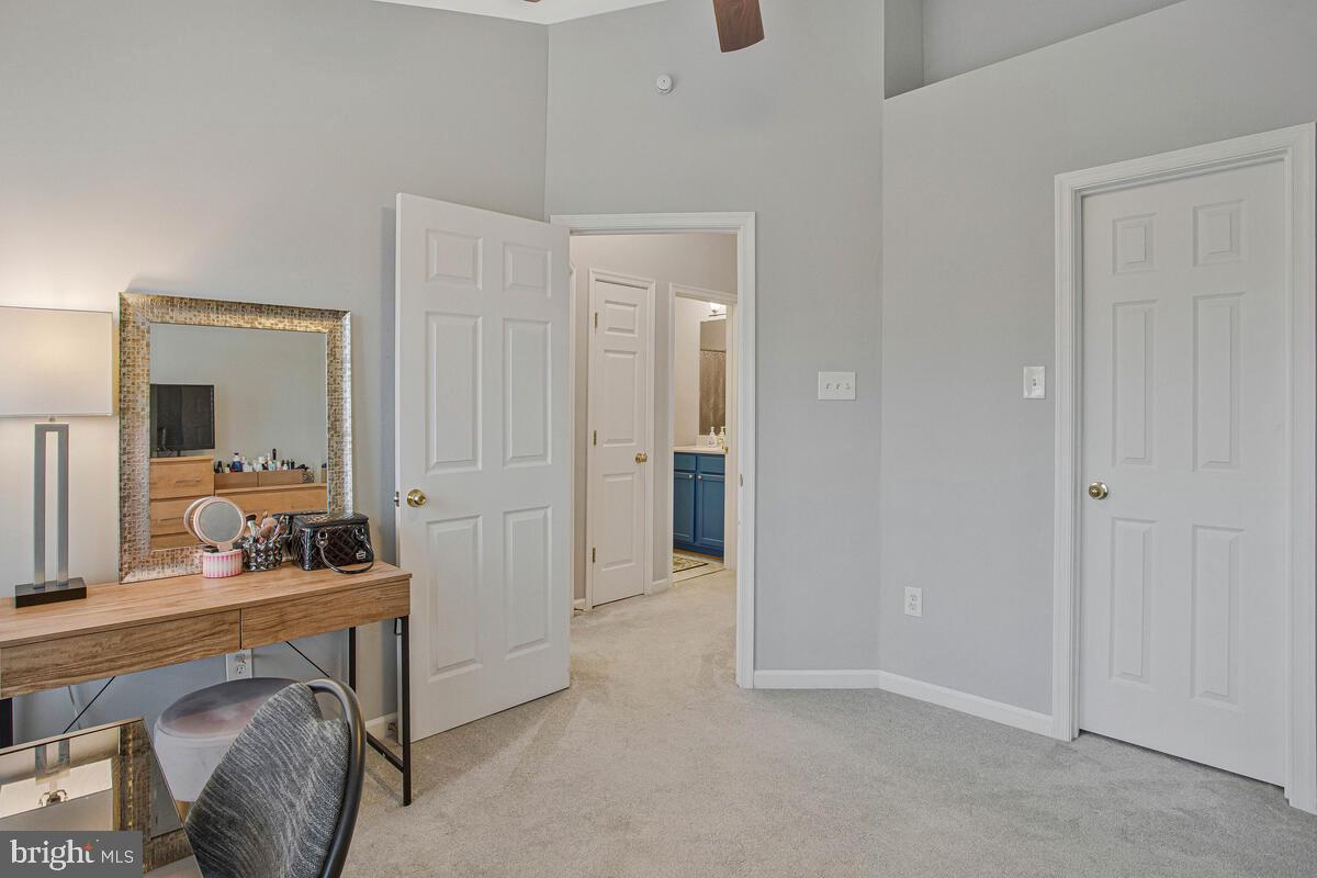3515 Cromarty Lane Edgewater, MD 21037 - Photo 37 of 53 a room that has a bed and a mirror in it