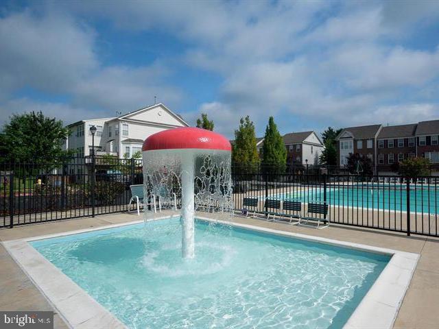 3515 Cromarty Lane Edgewater, MD 21037 - Photo 48 of 53 a view of a patio with a table and chairs