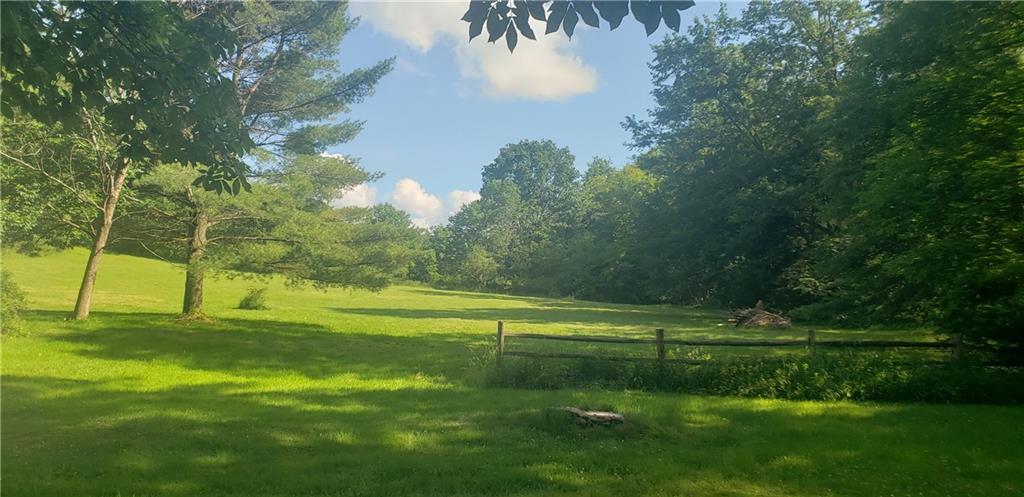 7 McDowell Road Ligonier, PA 15658 - Photo 6 of 20 Beautiful meadow opens up behind barn. Bring your horse!