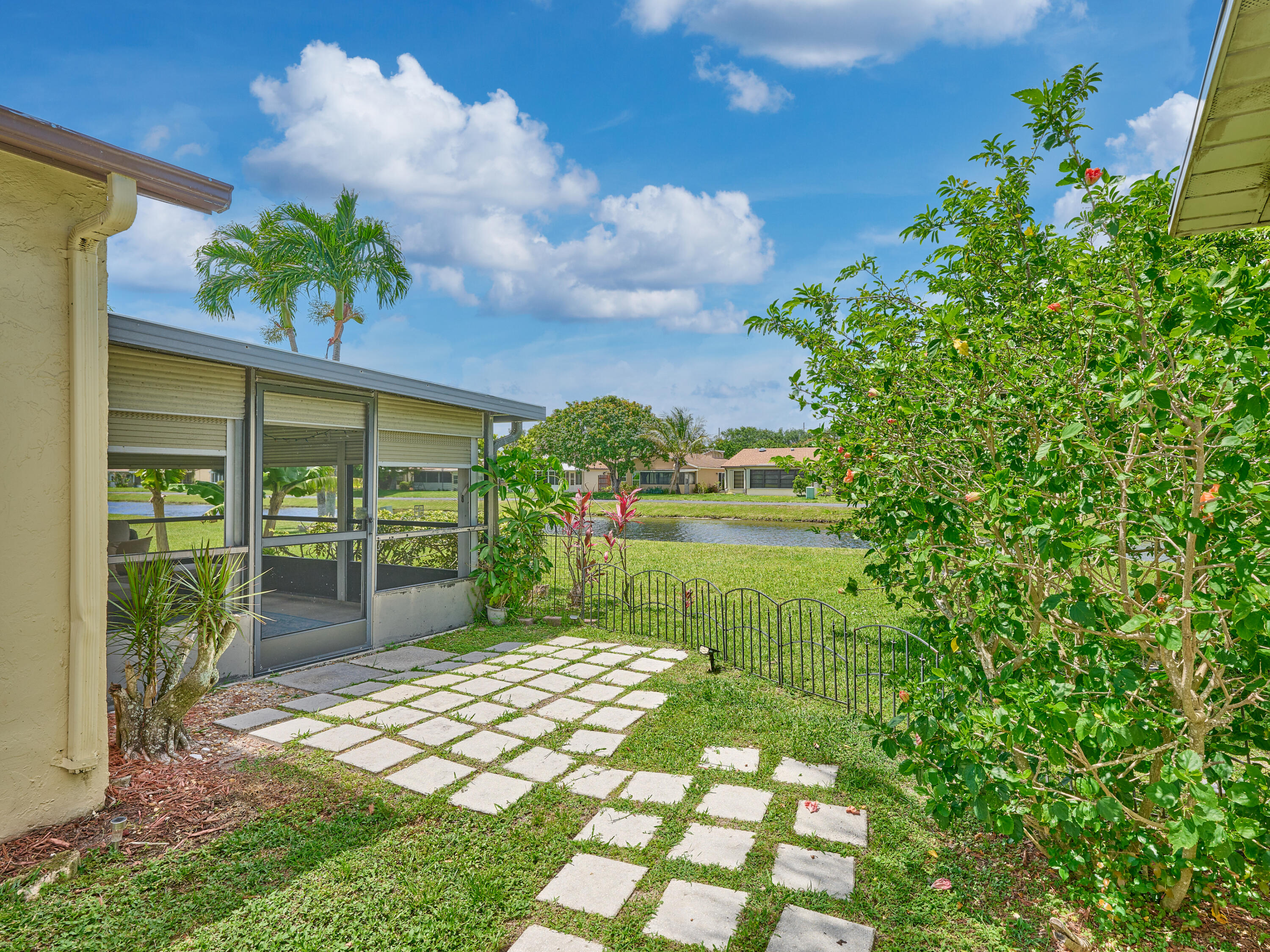 5197 Minto Road Boynton Beach, FL 33472 - Photo 3 of 32 a house view with a garden space