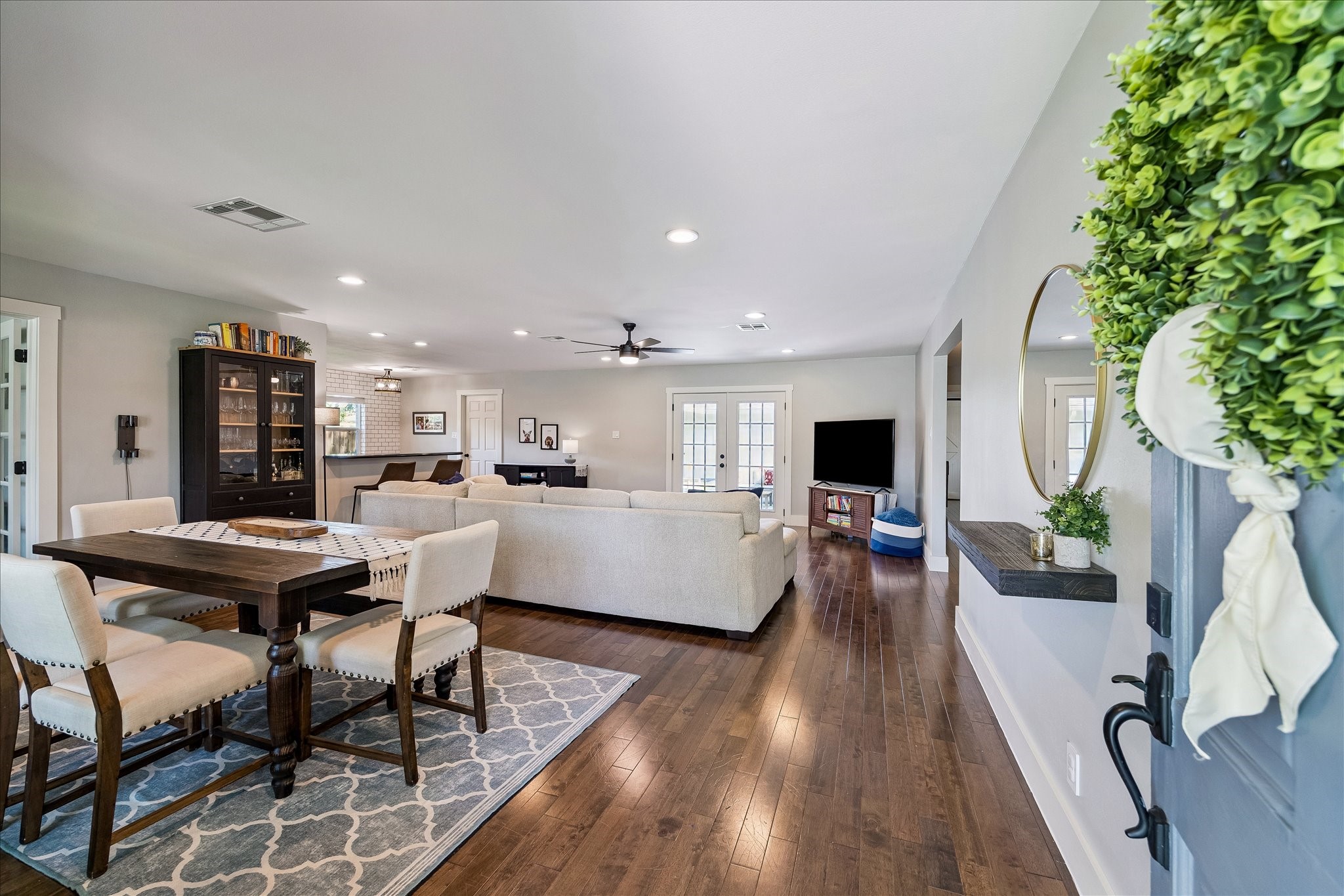 2203 Lamonte Lane Houston, TX 77018 - Photo 24 of 25 a living room with furniture and a wooden floor