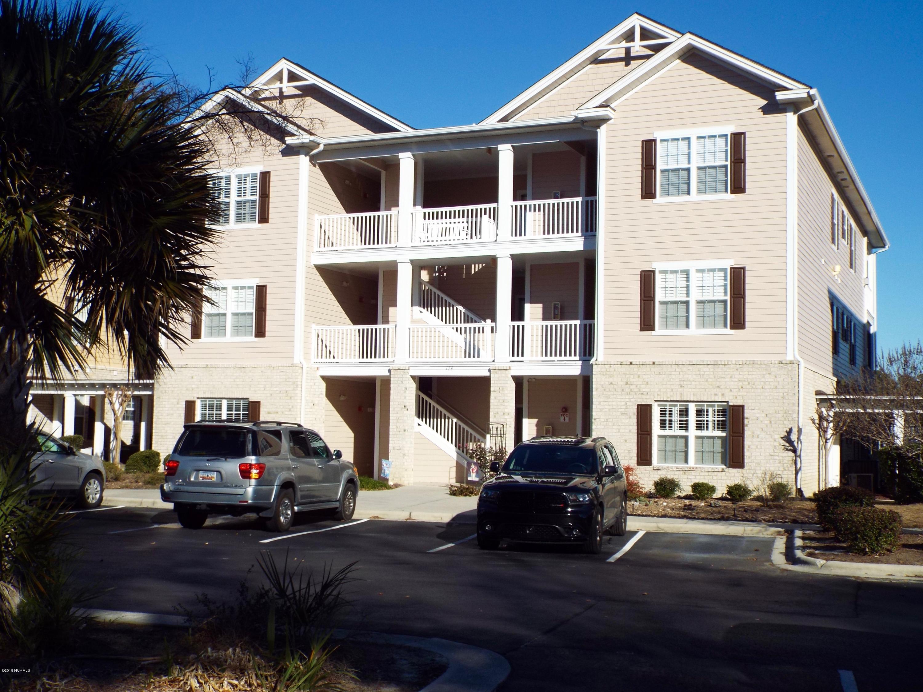 174 Clubhouse Road, Unit 1 Sunset Beach, NC 28468 - Photo 1 of 27 174 -1 Clubhouse - 1 of 5