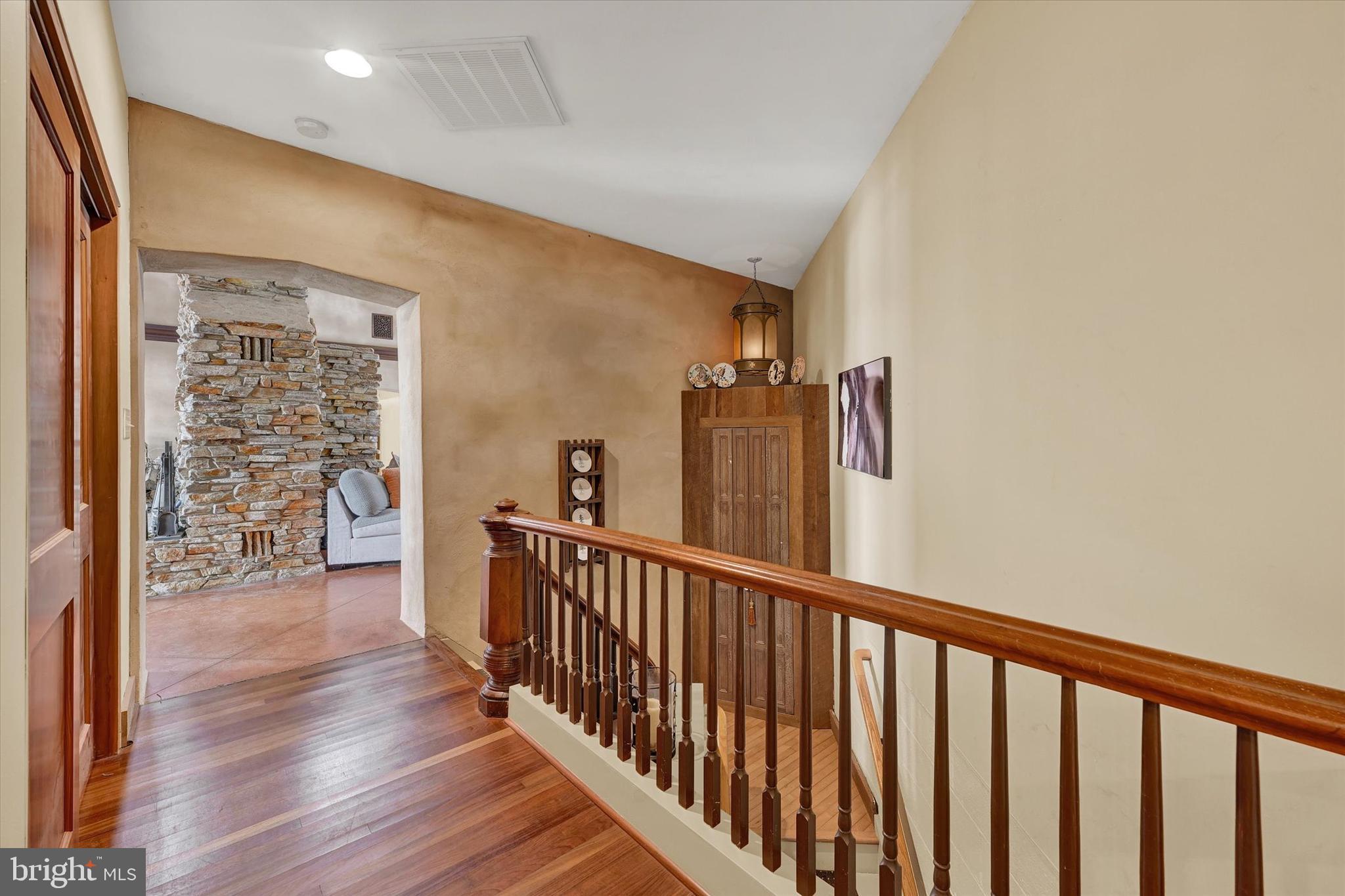 8272 Woodbine Road Airville, PA 17302 - Photo 25 of 60 Hall leads to Bedroom/Bath Wing & to Lower Level