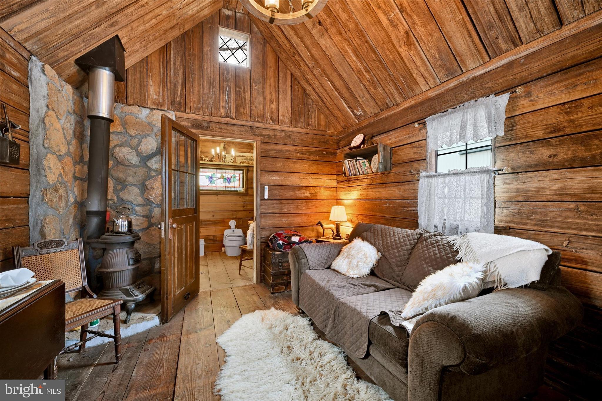 8272 Woodbine Road Airville, PA 17302 - Photo 57 of 77 Cabin Living Space, has Woodstove & Mini-Split