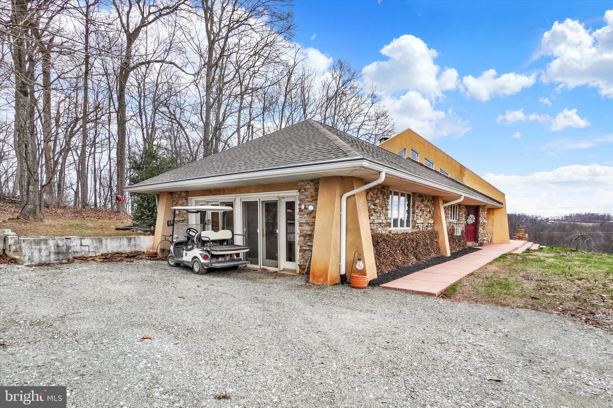 8272 Woodbine Road Airville, PA 17302 - Photo 10 of 68 a view of a house with backyard