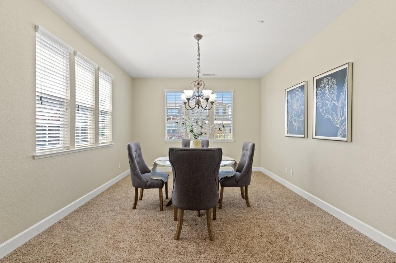 6307 Lookout Pass Way Rocklin, CA 95765 - Photo 11 of 72 a dining room with furniture and window