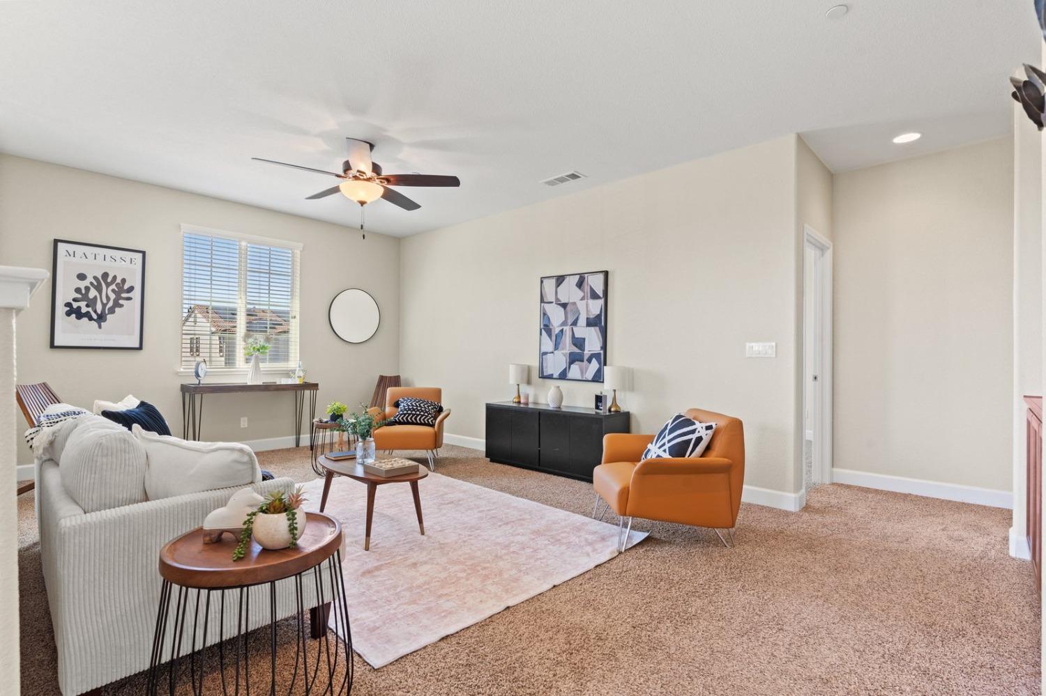 6307 Lookout Pass Way Rocklin, CA 95765 - Photo 49 of 72 a living room with furniture and a flat screen tv