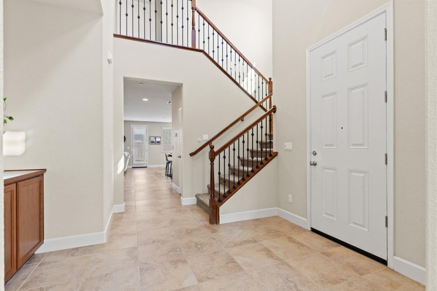 6307 Lookout Pass Way Rocklin, CA 95765 - Photo 8 of 72 a view of a hallway with staircase