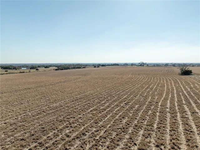 an aerial view of beach and ocean