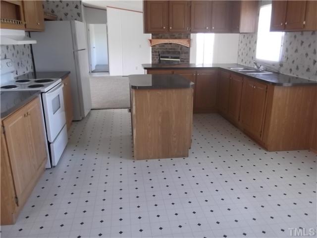 695 Oliver Loop Road Roxboro, NC 27574 - Photo 2 of 8 SPACIOUS KITCHEN WITH BREAKFAST AREA