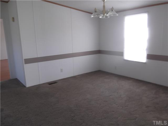 695 Oliver Loop Road Roxboro, NC 27574 - Photo 3 of 8 SEPARATE DINING ROOM