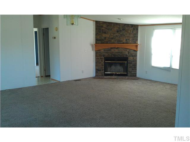 695 Oliver Loop Road Roxboro, NC 27574 - Photo 4 of 8 GREAT ROOM WITH FIREPLACE