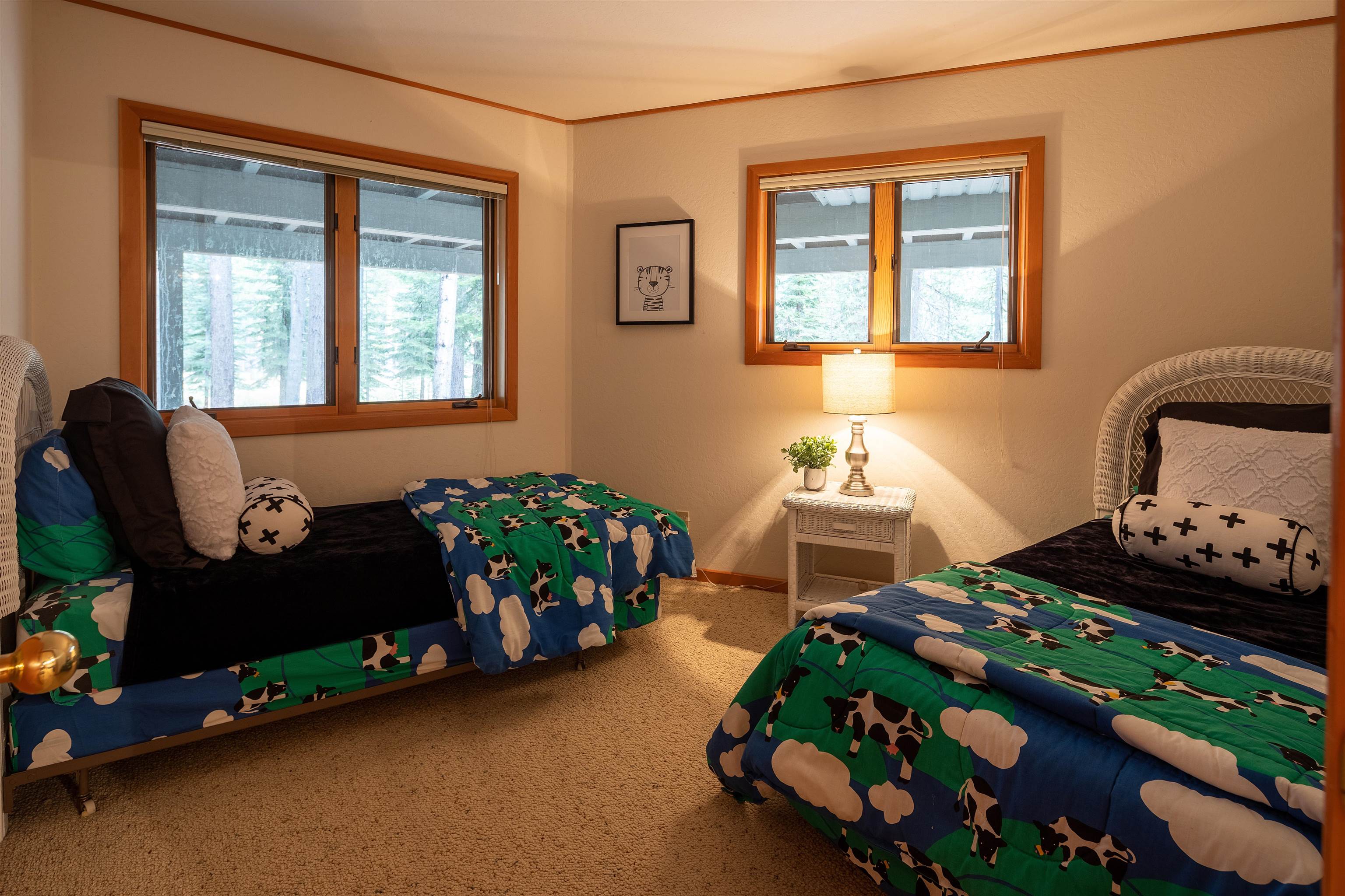 11406 Chalet Road Truckee, CA 96161 - Photo 12 of 21 a bedroom with a bed and windows